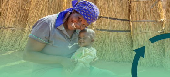 A mother holding her child receives care through a MAP partner clinic